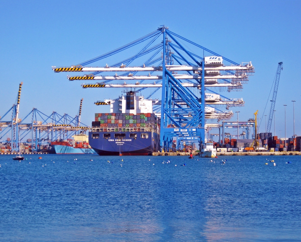 Container ship loading at a port terminal